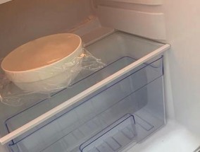 冰箱光转不制冷的解决办法（从清洁到维修）